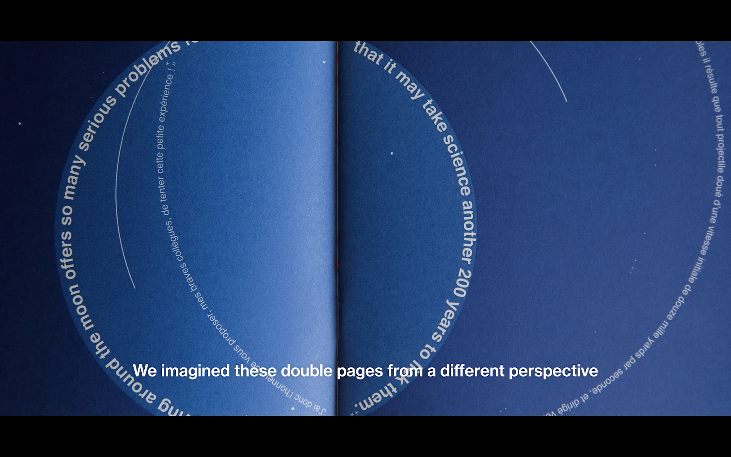 A dark blue spread with fine white lettering curving across the page
